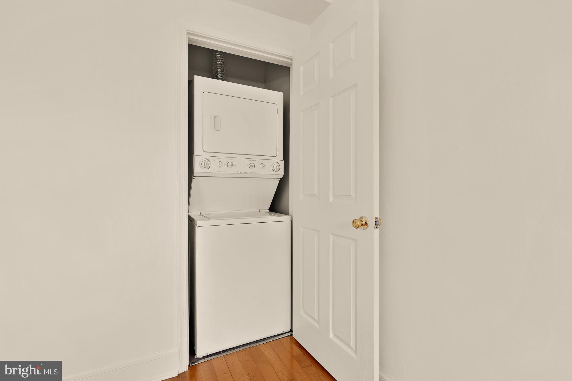 1254 Simms Place Northeast Washington, DC 20002 - Photo 8 of 21 a view of a storage and utility room with washer and dryer