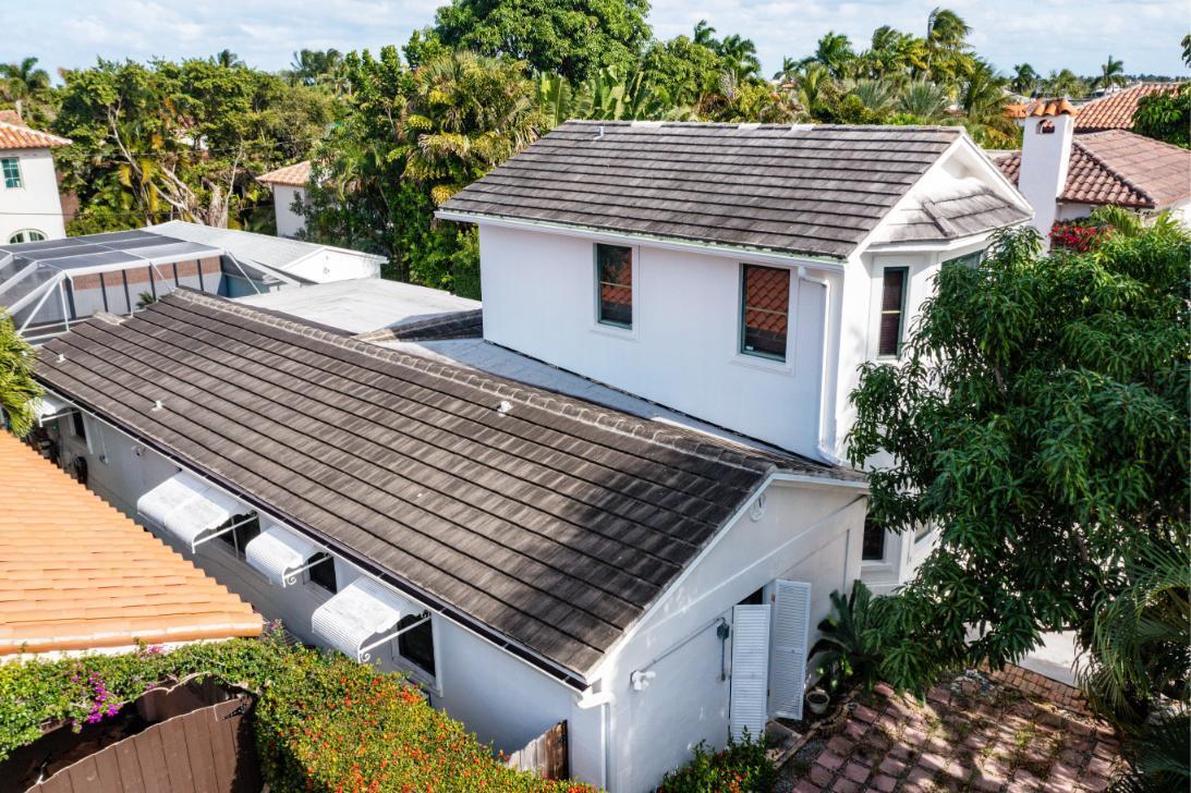 217 Sunset Road West Palm Beach, FL 33401 - Photo 11 of 16 a view of a house with a yard