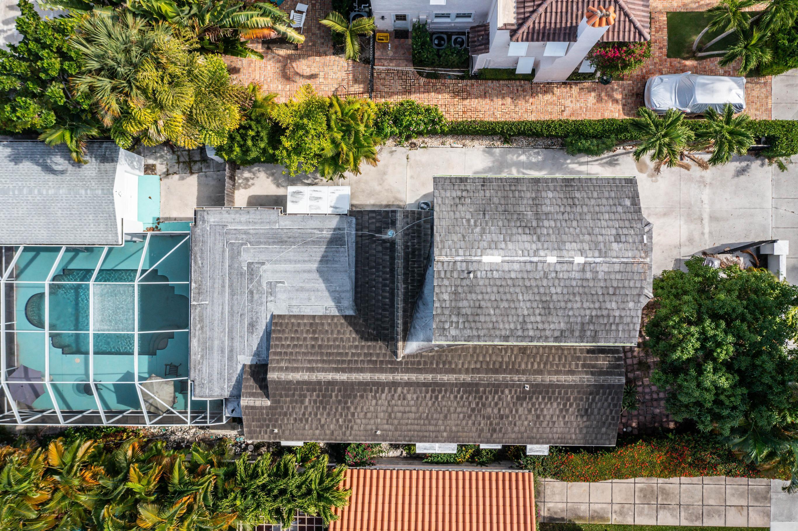 217 Sunset Road West Palm Beach, FL 33401 - Photo 4 of 16 an aerial view of a house with a yard