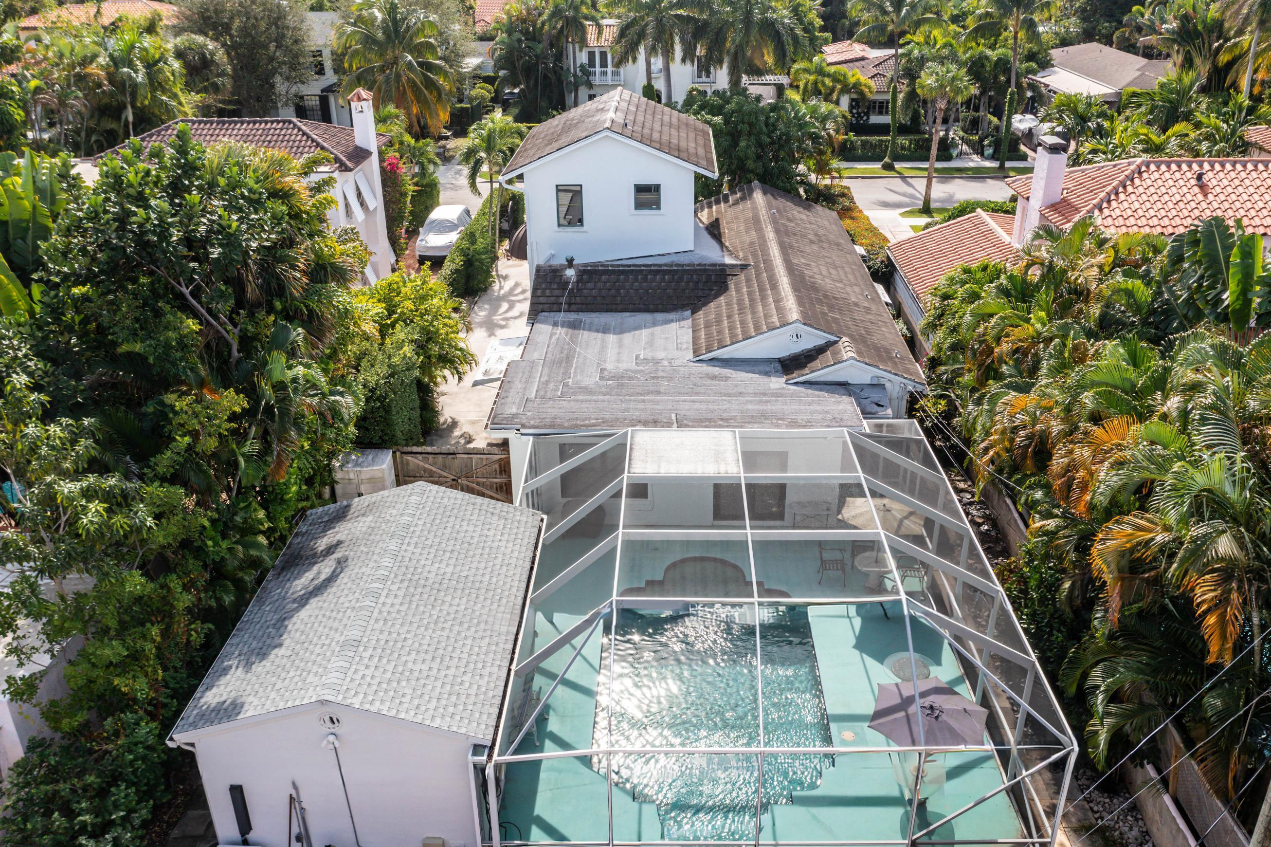 217 Sunset Road West Palm Beach, FL 33401 - Photo 5 of 16 an aerial view of a house with a yard