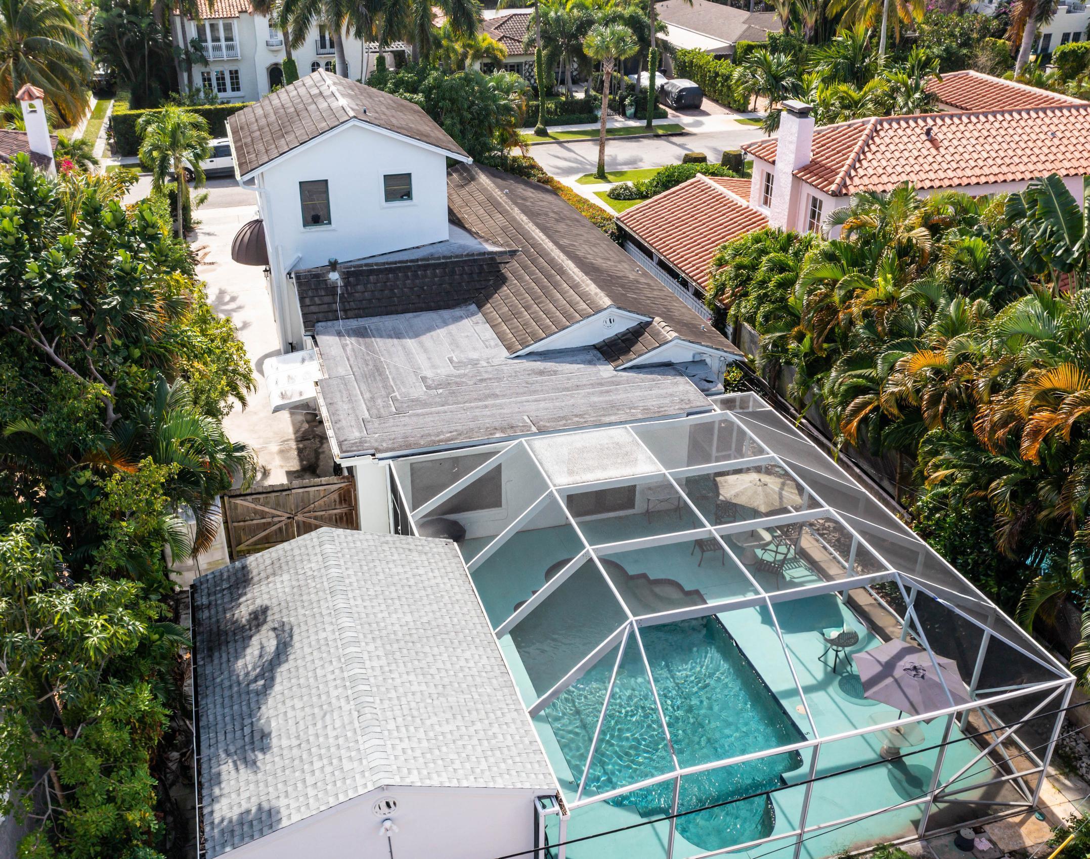 217 Sunset Road West Palm Beach, FL 33401 - Photo 6 of 16 a aerial view of a house with a yard