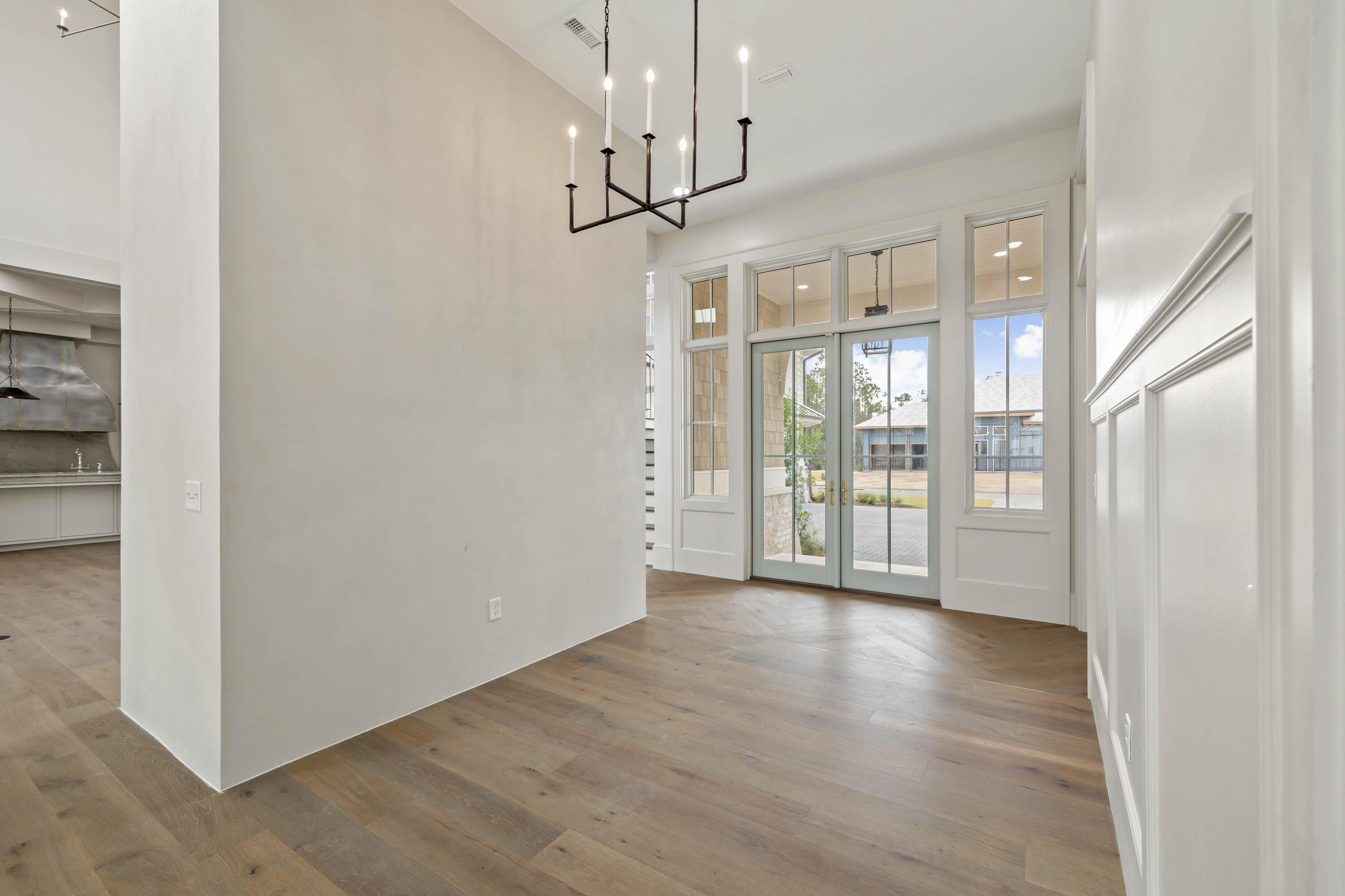 99 Morning Light Way Inlet Beach Inlet Beach, FL 32461 - Photo 34 of 97 a view of a big room with wooden floor windows and a chandelier