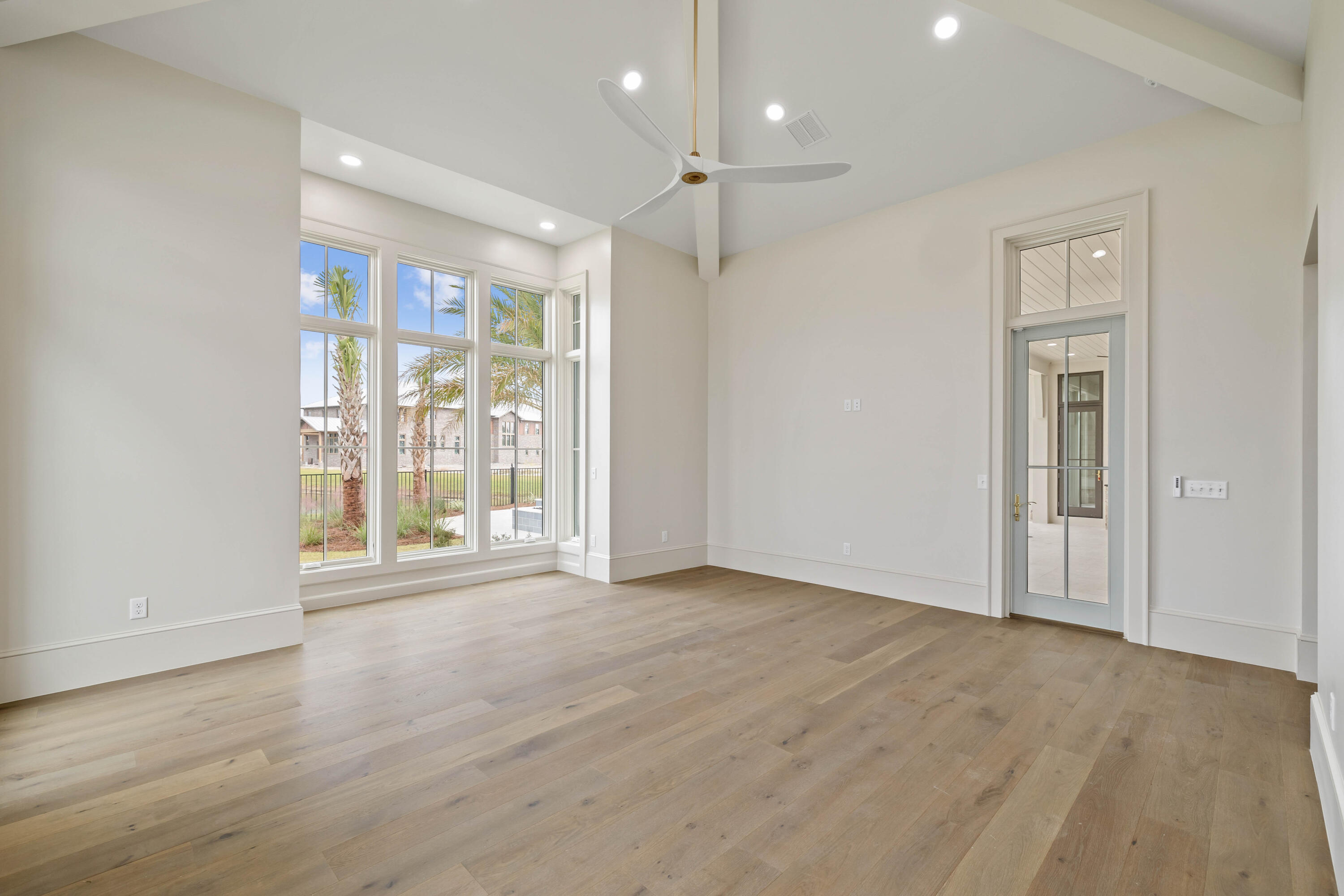 99 Morning Light Way Inlet Beach Inlet Beach, FL 32461 - Photo 42 of 97 a view of an empty room with wooden floor and a window