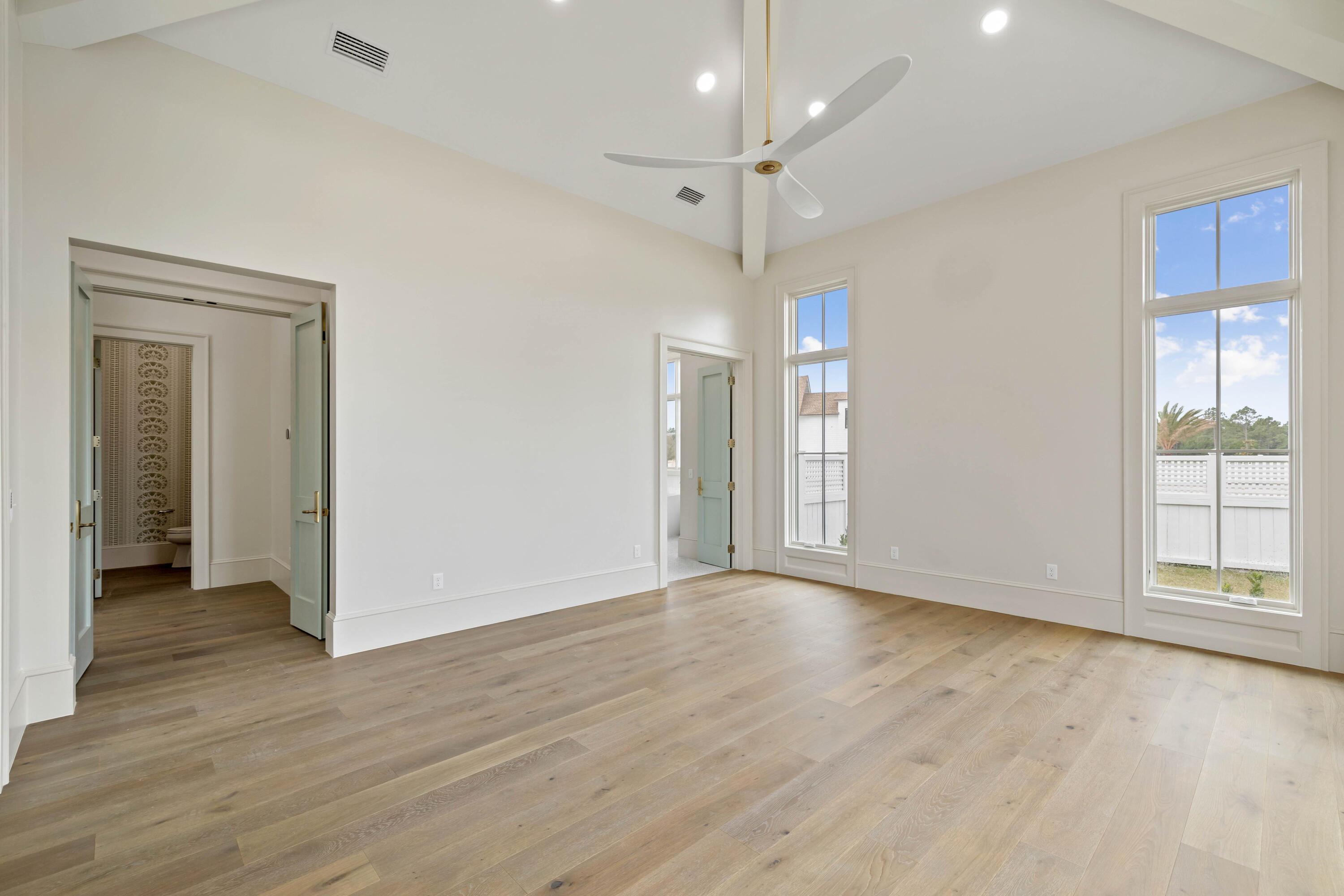 99 Morning Light Way Inlet Beach Inlet Beach, FL 32461 - Photo 43 of 97 a view of an empty room with wooden floor and a window