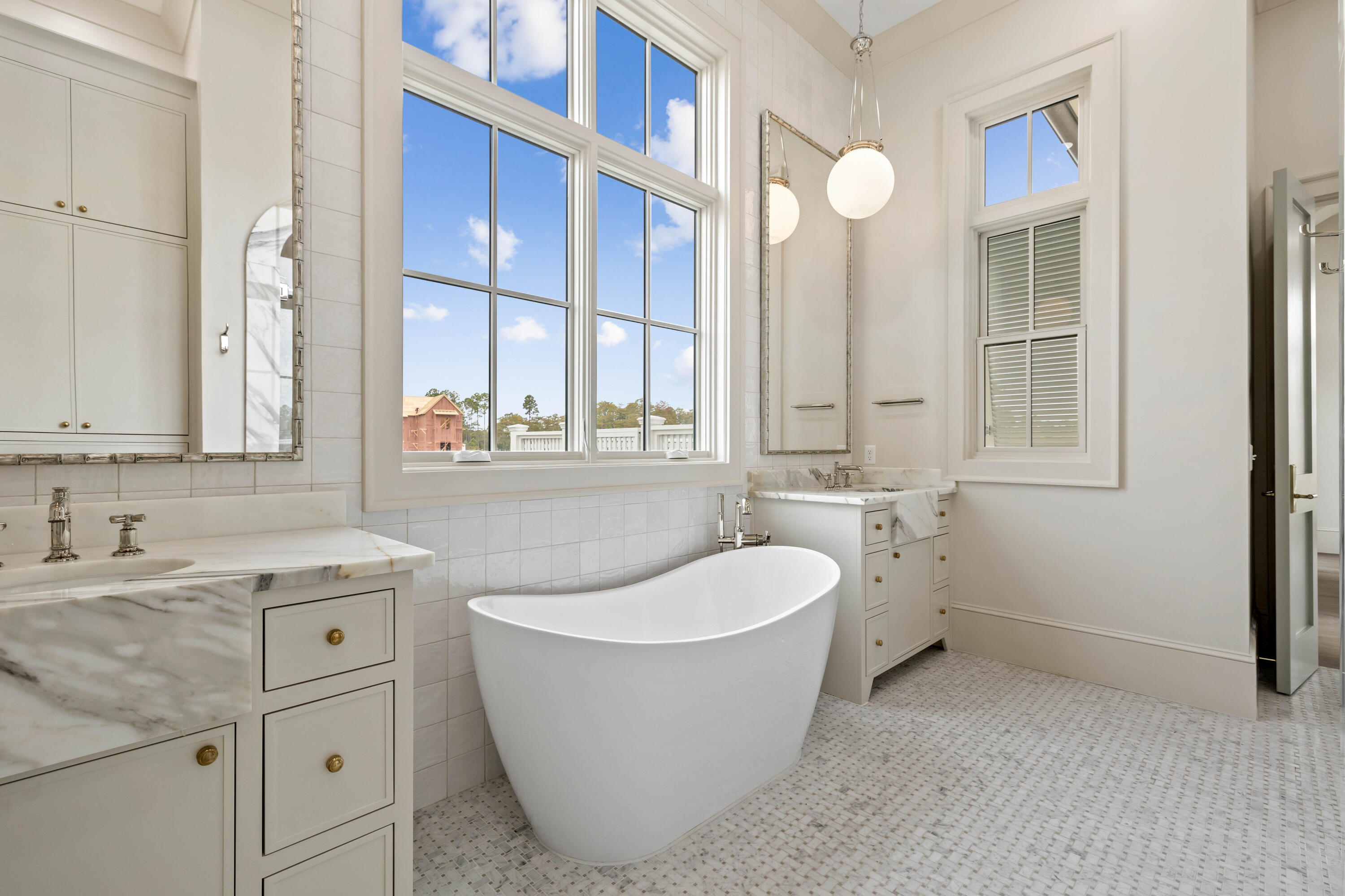 99 Morning Light Way Inlet Beach Inlet Beach, FL 32461 - Photo 46 of 97 a bathroom with a bathtub sink and mirror