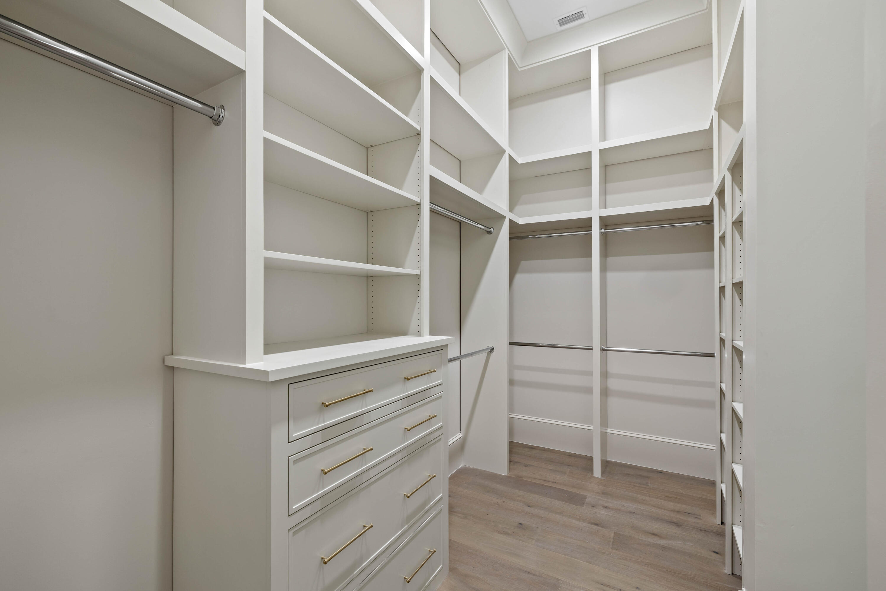 99 Morning Light Way Inlet Beach Inlet Beach, FL 32461 - Photo 50 of 97 a view of walk in closet with empty racks