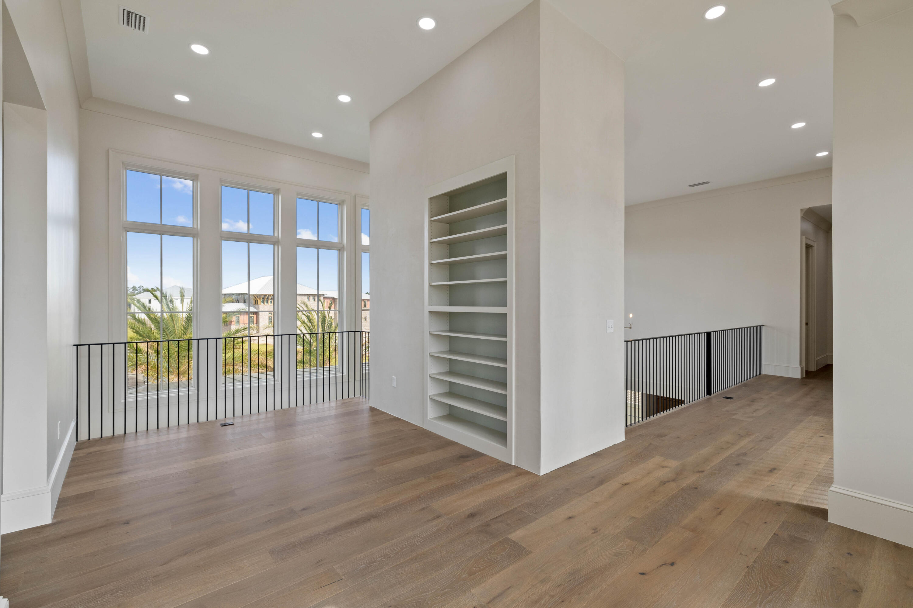 99 Morning Light Way Inlet Beach Inlet Beach, FL 32461 - Photo 72 of 97 an empty room with wooden floor and windows
