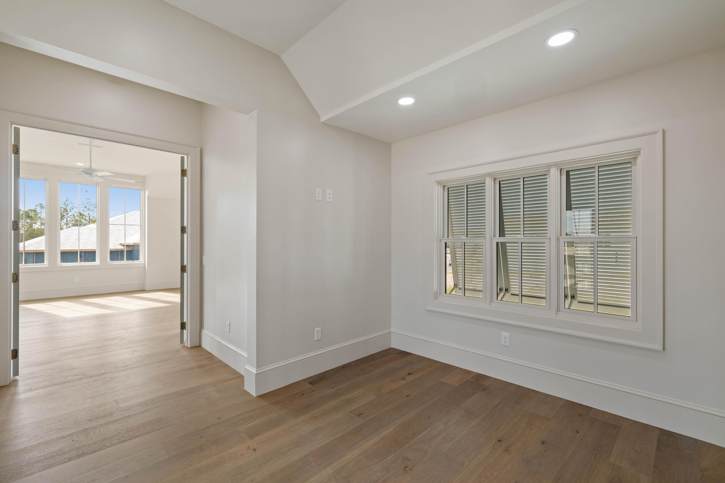 99 Morning Light Way Inlet Beach Inlet Beach, FL 32461 - Photo 89 of 97 an empty room with wooden floor and windows