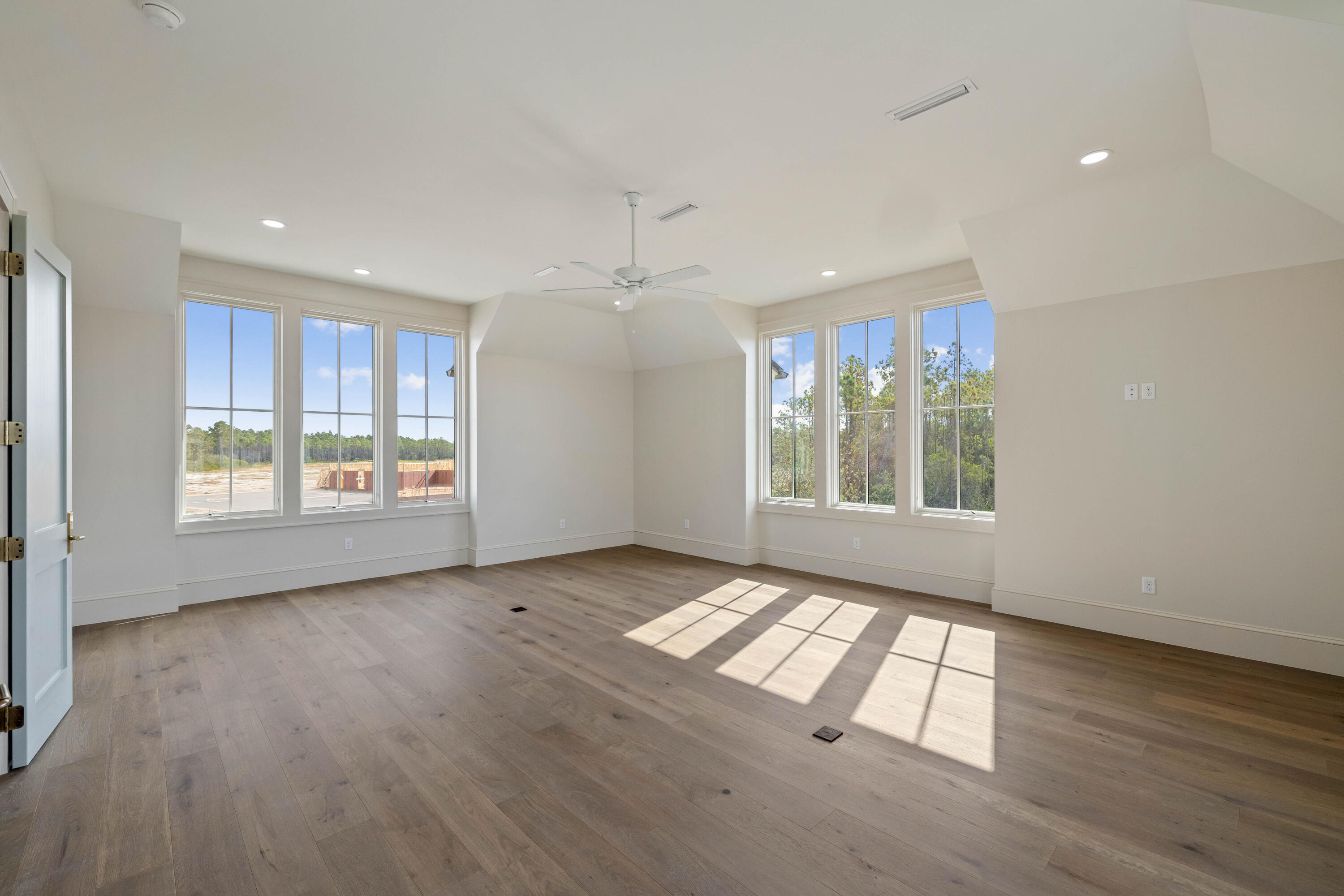 99 Morning Light Way Inlet Beach Inlet Beach, FL 32461 - Photo 92 of 97 a view of an empty room with glass door and wooden floor