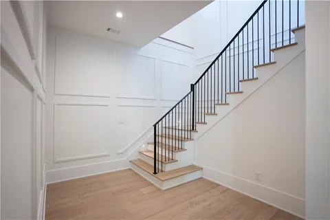 a view of a swimming pool with a yard and lake view