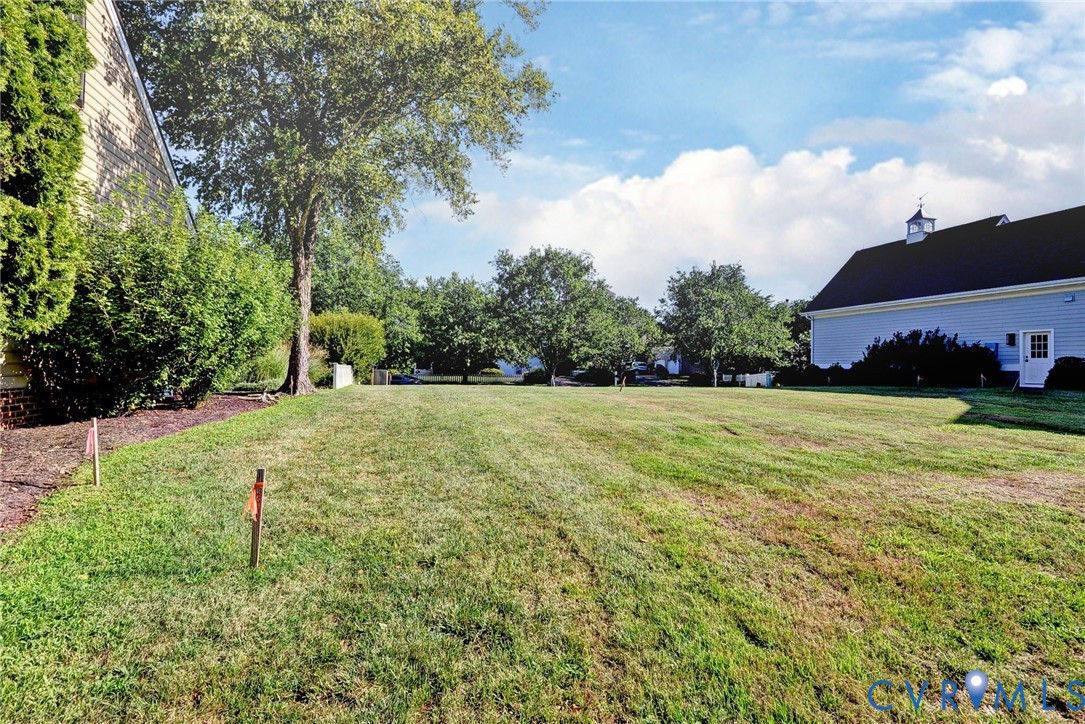 1540 Harbor Road Williamsburg, VA 23185 - Photo 12 of 50 a view of a field of grass and trees
