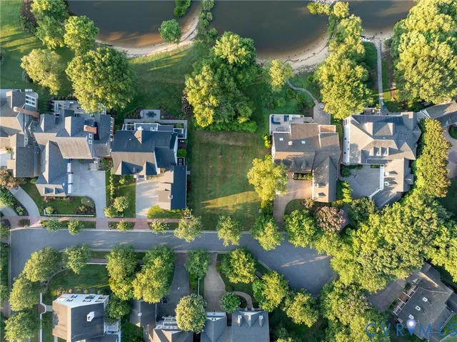a view of a park with large trees