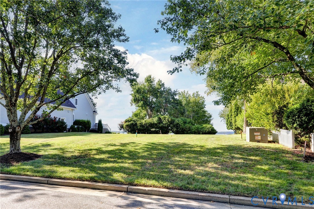 1540 Harbor Road Williamsburg, VA 23185 - Photo 3 of 50 a view of a swimming pool with a house in the background