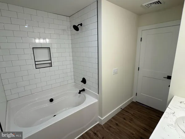 a bathroom with a bathtub
