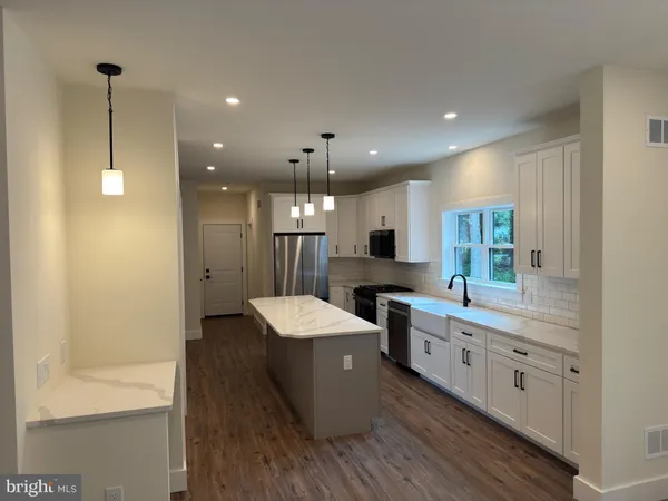 a large kitchen with a lot of counter space