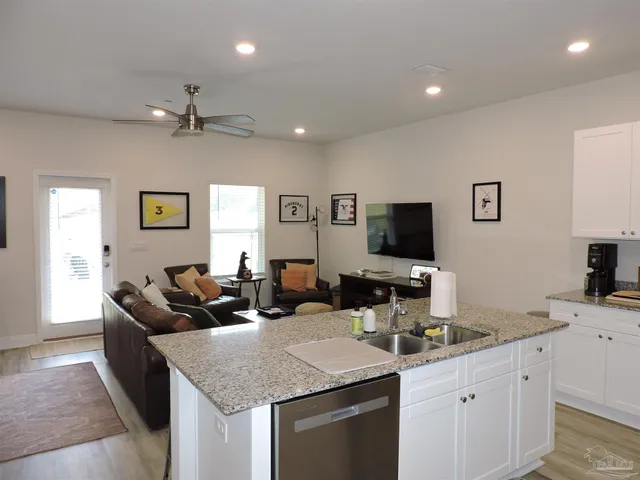 a kitchen with granite countertop lots of counter top space