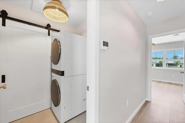 a view of a storage & utility room with a window