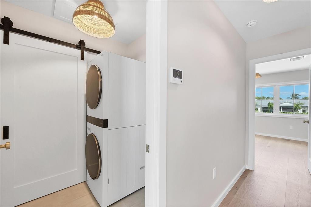 290 Gulf Boulevard, Unit 18 Boca Grande, FL 33921 - Photo 36 of 49 a view of a storage & utility room with a window