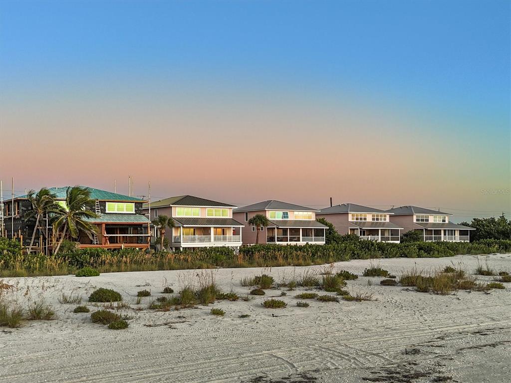 290 Gulf Boulevard, Unit 18 Boca Grande, FL 33921 - Photo 40 of 49 a view of multiple houses with a yard
