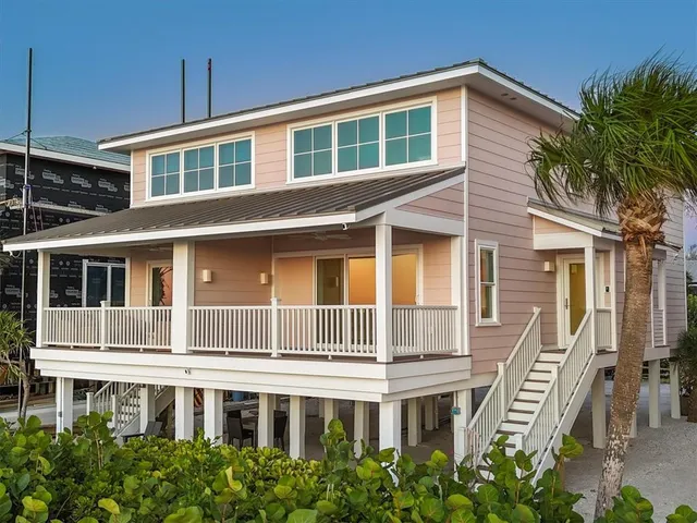 a front view of a house with a balcony