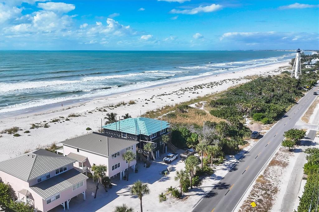 290 Gulf Boulevard, Unit 18 Boca Grande, FL 33921 - Photo 46 of 49 a view of a terrace with lawn chairs