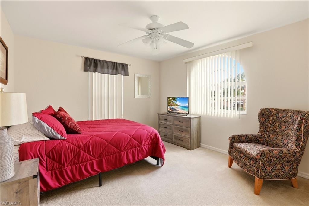21524 Windham Run Estero, FL 33928 - Photo 23 of 50 a living room with furniture and a window