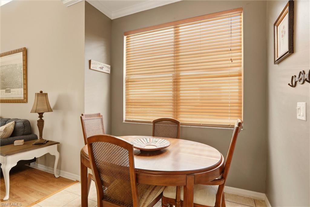 21524 Windham Run Estero, FL 33928 - Photo 25 of 50 a view of a dining room with furniture and window