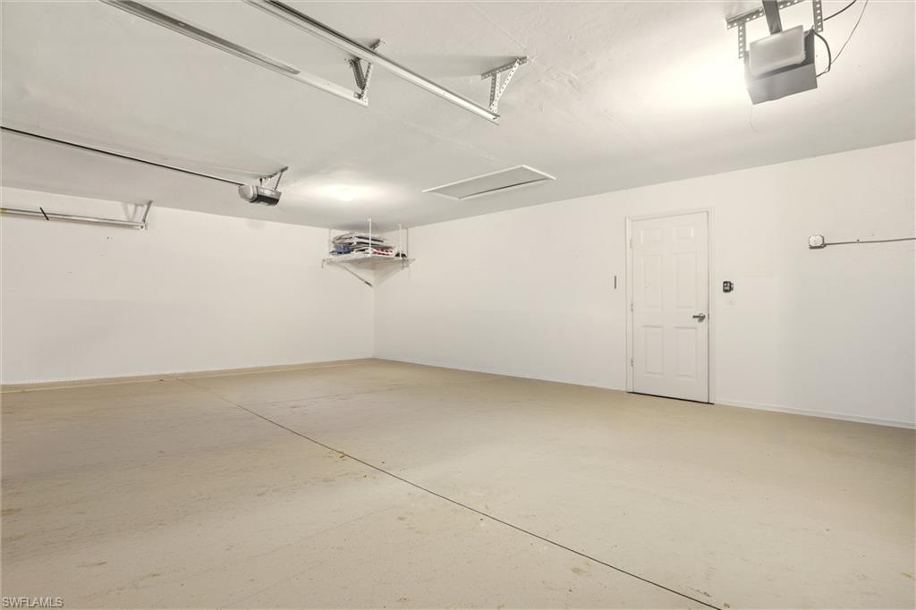 21524 Windham Run Estero, FL 33928 - Photo 36 of 50 a view of a room with racks on the wall