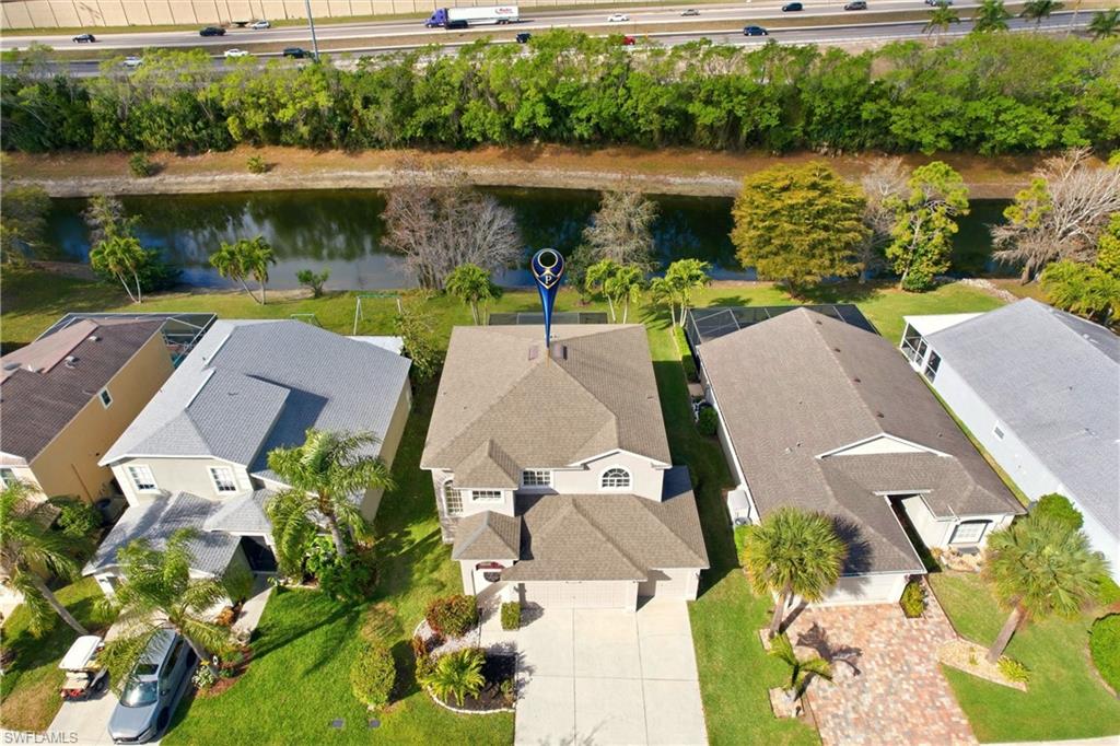 21524 Windham Run Estero, FL 33928 - Photo 43 of 50 an aerial view of a house with a lake view