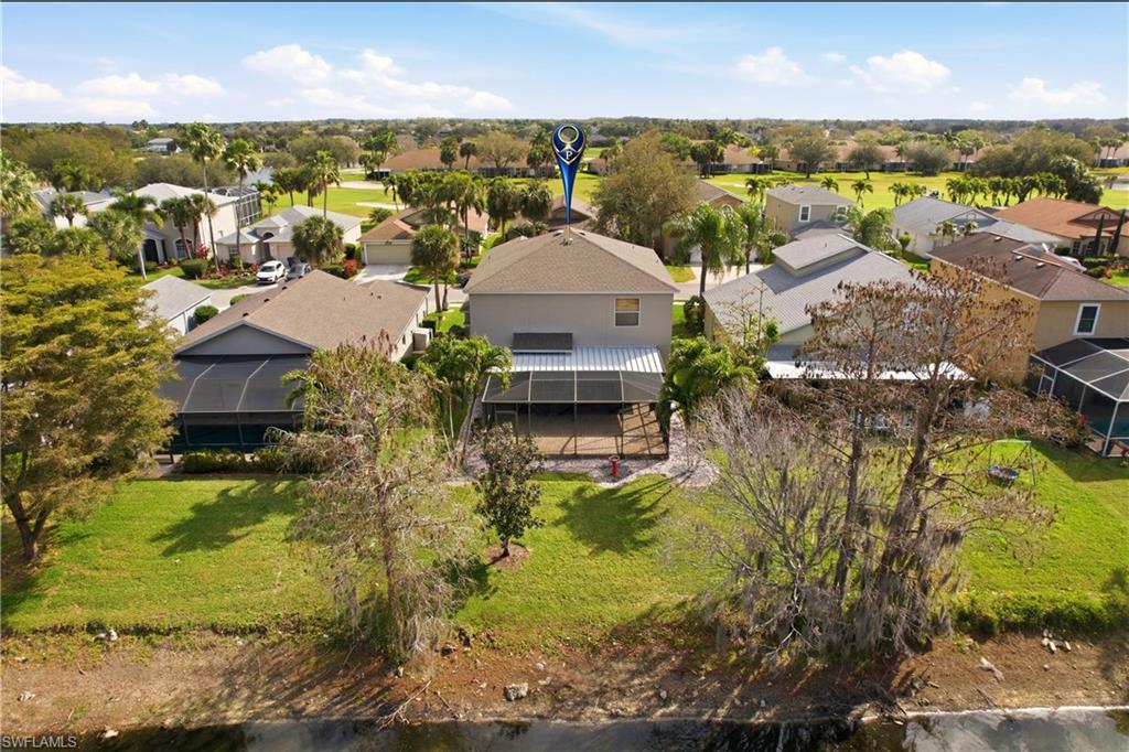 21524 Windham Run Estero, FL 33928 - Photo 45 of 50 an aerial view of residential building with outdoor space