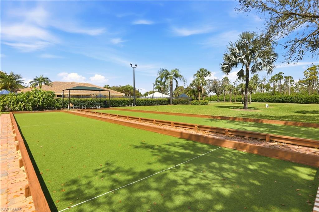 21524 Windham Run Estero, FL 33928 - Photo 49 of 50 a view of a golf course with a lake