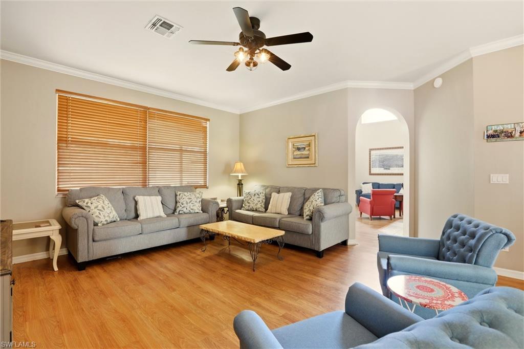 21524 Windham Run Estero, FL 33928 - Photo 8 of 50 a living room with furniture or couch and a window