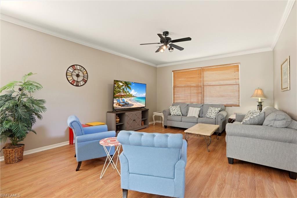 21524 Windham Run Estero, FL 33928 - Photo 9 of 50 a living room with furniture and a window