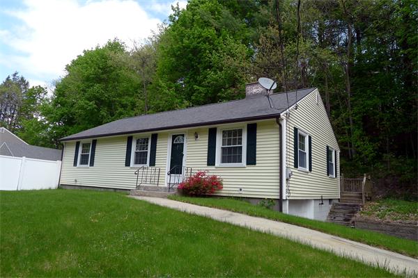 43 Boston Road Groton, MA 01450 - Photo 1 of 23 a front view of a house with garden