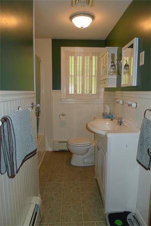43 Boston Road Groton, MA 01450 - Photo 11 of 23 a bathroom with a sink toilet and shower