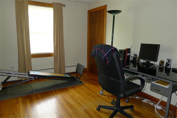 43 Boston Road Groton, MA 01450 - Photo 10 of 23 a view of a workspace with furniture and a window