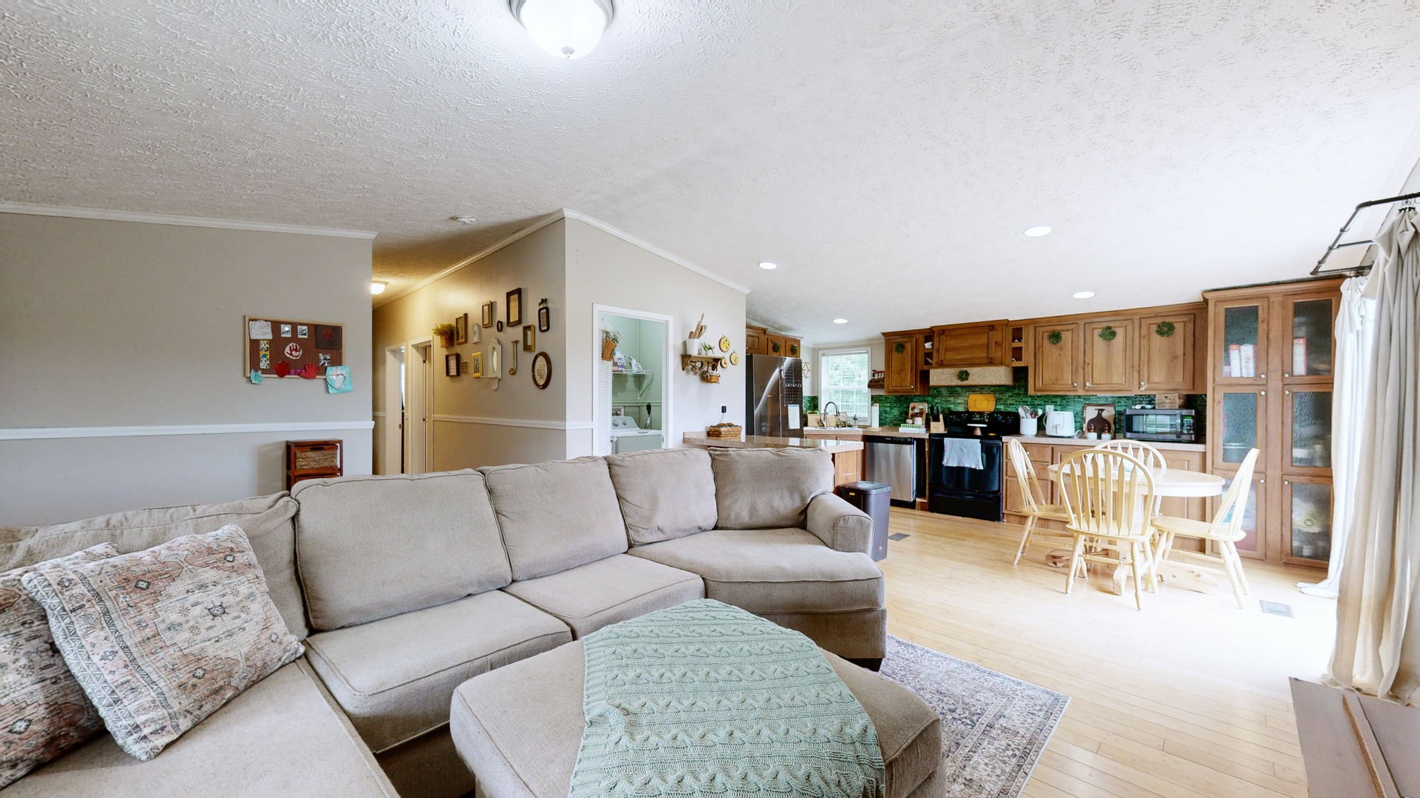 133 Cleveland Road Wartrace, TN 37183 - Photo 4 of 23 a living room with furniture and a view of kitchen