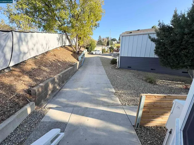 a view of backyard with green space