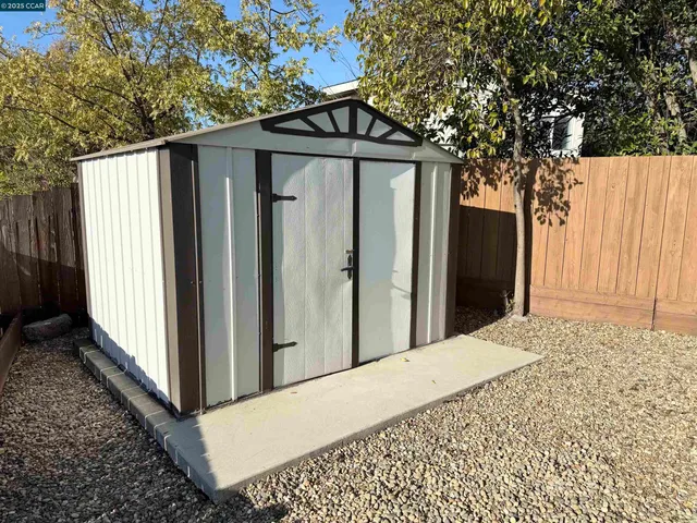 a front view of a house with a shower