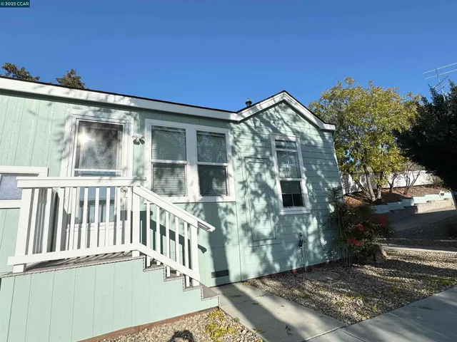 a view of a back yard of the house