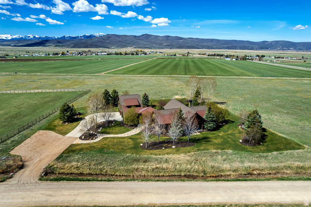 2579 Splendor Valley Road Kamas, UT 84036 - Photo 26 of 87 Aerial view of sparsely populated area with agricultural land and a mountain backdrop