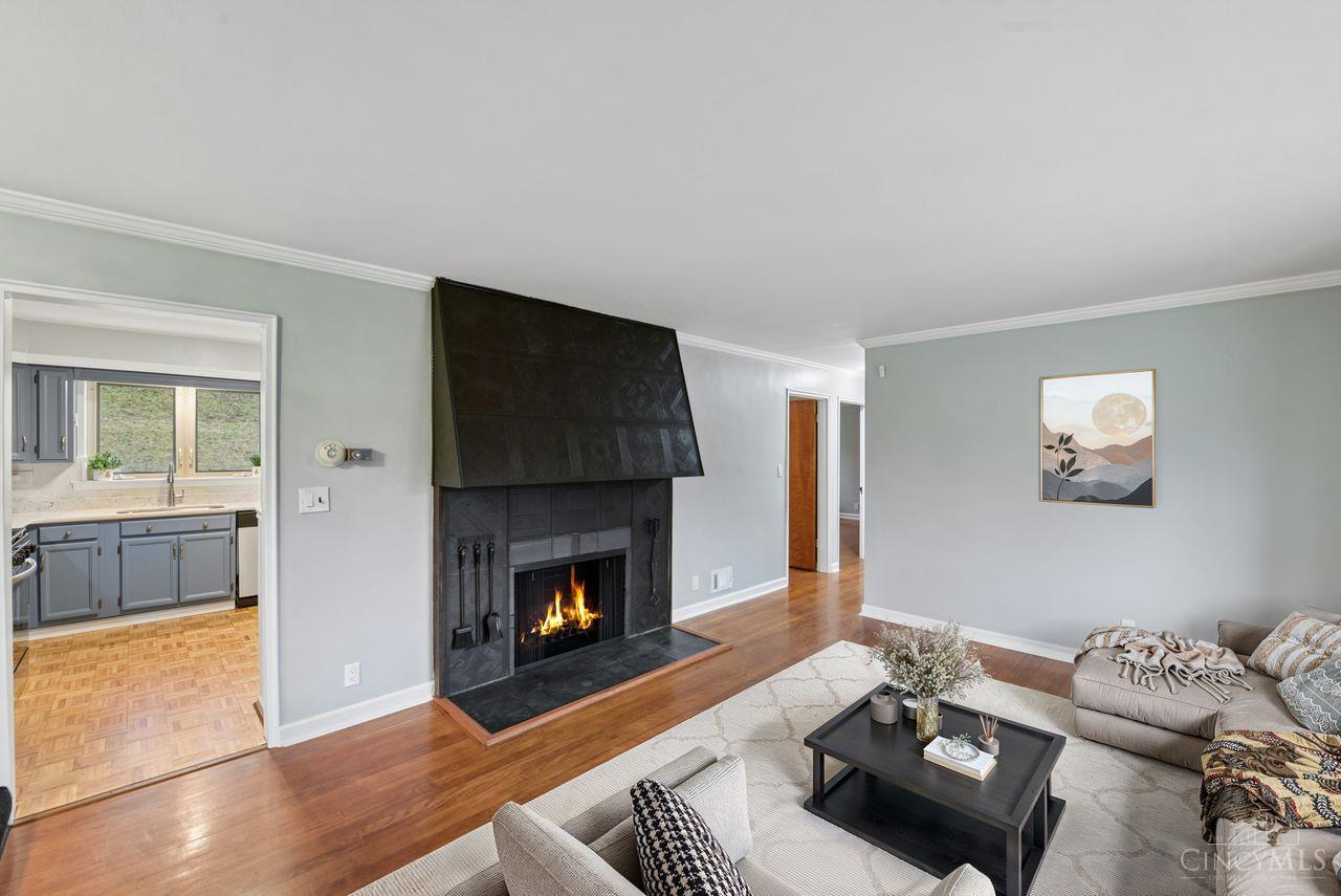 5258 Shepherd Road Cincinnati, OH 45223 - Photo 5 of 43 The Living Room has been virtually staged to show a possible furniture layout. The fireplace is inoperable but if you add fake logs, this is how it could look.