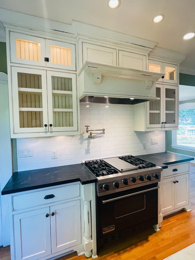 11995 Walbrook Drive Saratoga, CA 95070 - Photo 12 of 26 a kitchen with stainless steel appliances a stove and a sink