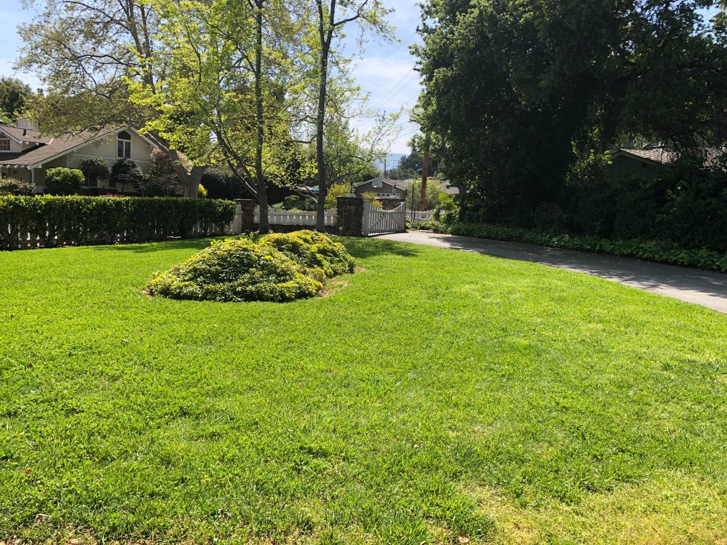 11995 Walbrook Drive Saratoga, CA 95070 - Photo 2 of 26 a view of a backyard with large trees