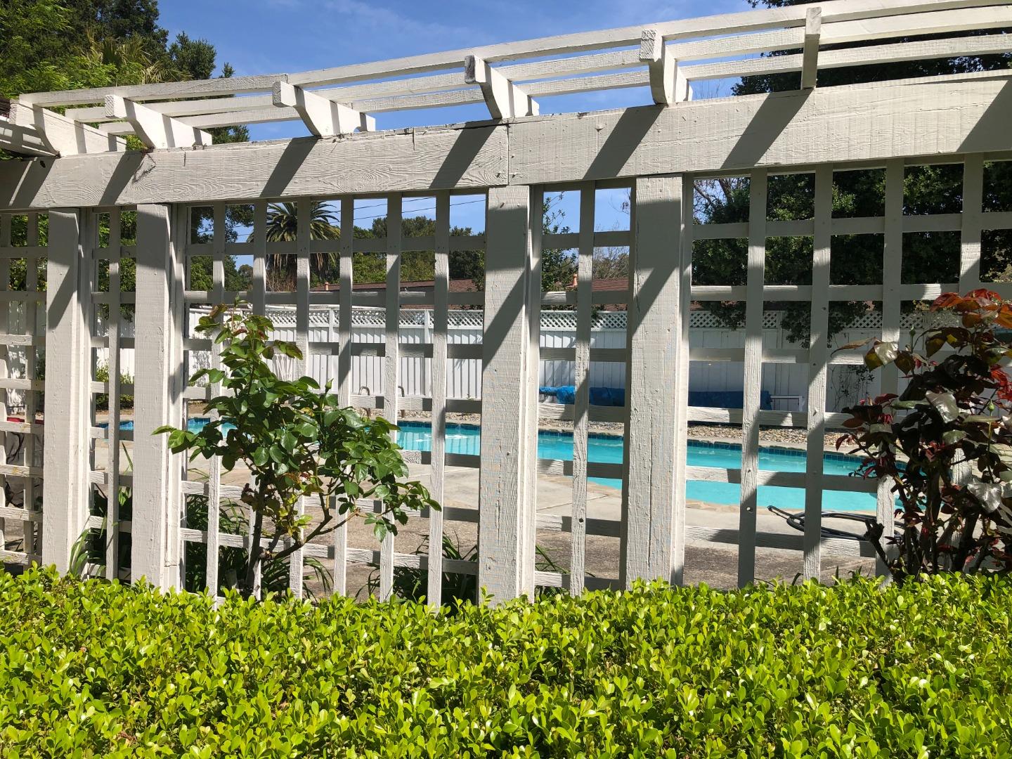 11995 Walbrook Drive Saratoga, CA 95070 - Photo 22 of 26 a house view with a outdoor space