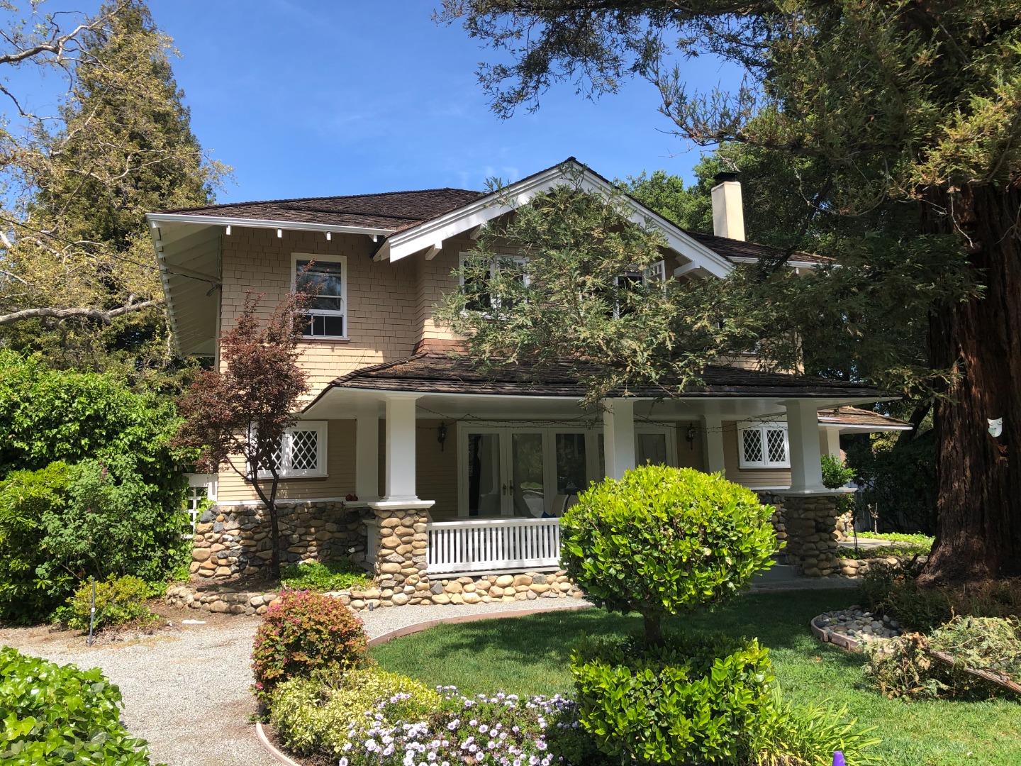 11995 Walbrook Drive Saratoga, CA 95070 - Photo 3 of 26 front view of a house with a yard