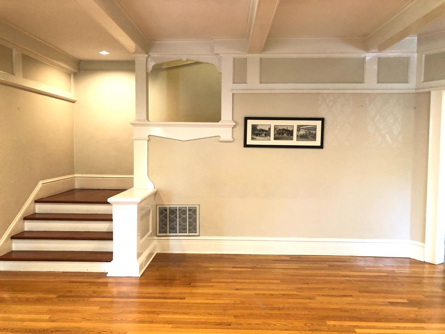 11995 Walbrook Drive Saratoga, CA 95070 - Photo 4 of 26 a view of a living room with wooden floor and a large window