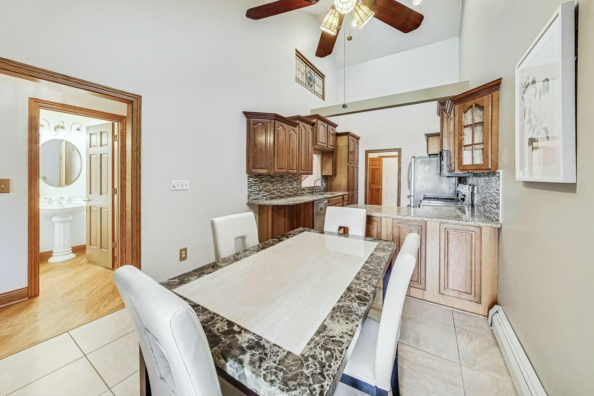 3519 Wicker Avenue Highland, IN 46322 - Photo 11 of 49 a large bedroom with a bed and a view of living room