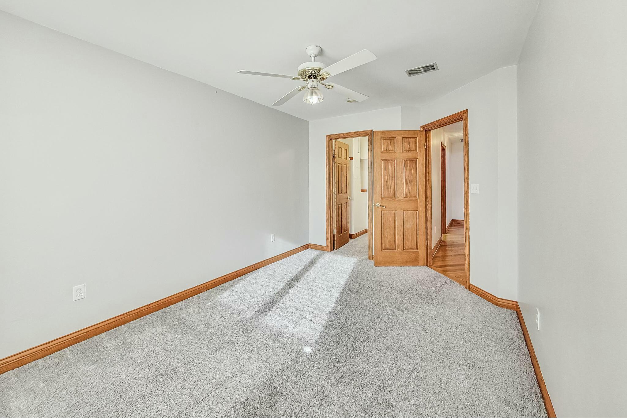 3519 Wicker Avenue Highland, IN 46322 - Photo 32 of 49 a view of a livingroom with a ceiling fan and window