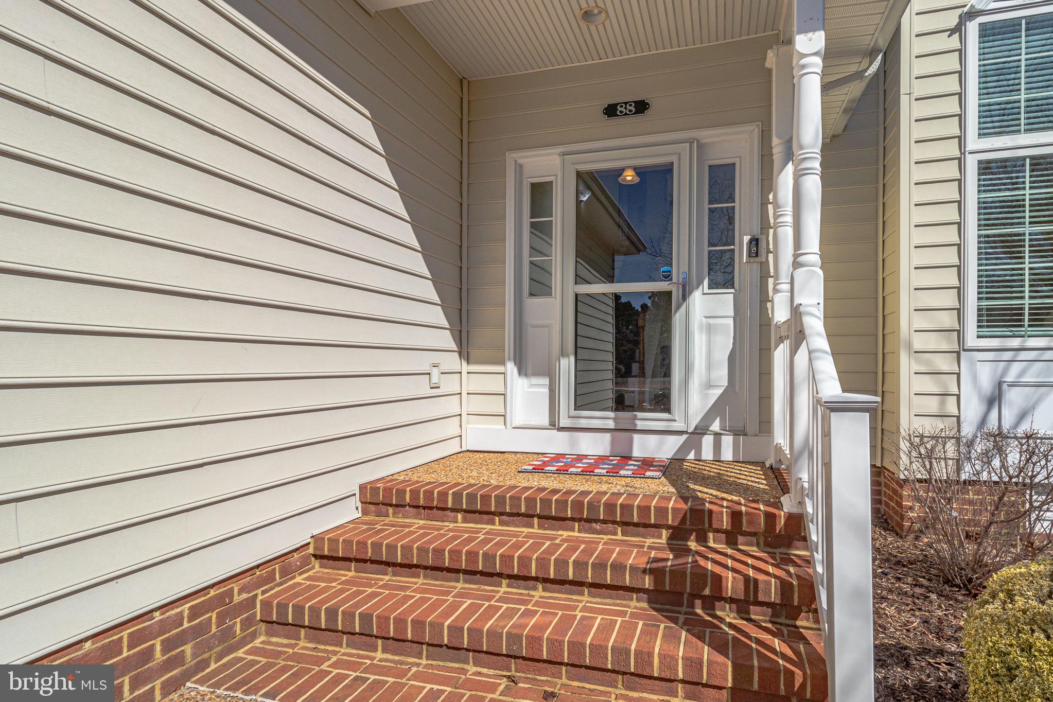88 Old Field Road Irvington, VA 22480 - Photo 14 of 55 a bedroom with a bed and a window